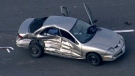 A damaged Pontiac Sunfire is seen after a collision on the eastbound on Hwy. 401 near Highway 25 on Friday, Nov. 18, 2011.