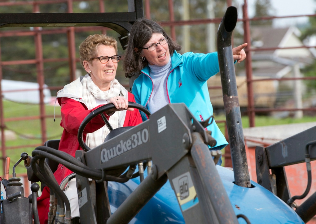 Wynne accused of driving tractor the wrong way
