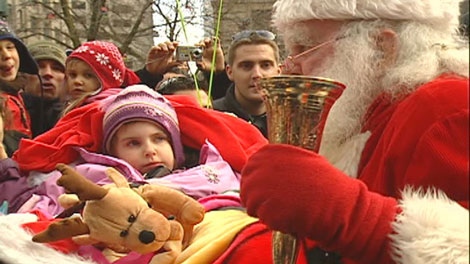Santa Claus visited boys and girls in Montreal Saturday.