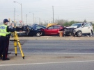 Police investigate a crash at Highway 27 and Belfield Road in Toronto on Wednesday, May 21, 2014. (Cam Woolley/CP24)