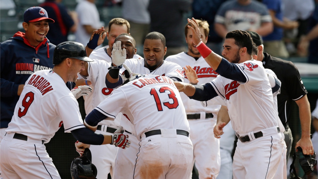Cleveland Indians celebrate with Cabrera