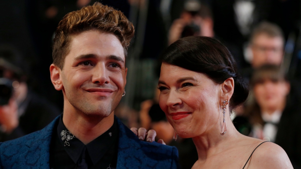 Director Xavier Dolan and actress Anne Dorval arri