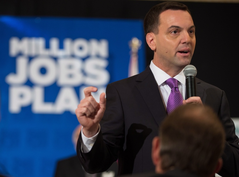 Ontario Progressive Conservative leader Tim Hudak speaks to a lunchtime meeting of the Chamber of Commerce in London, Ontario, Friday, May 23, 2014. THE CANADIAN PRESS/ Geoff Robins
