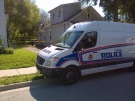 London police investigate homicide at 98 Clarence St. in London, Ont. on May 25, 2014. (Matt Thompson / CTV London)