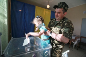Ukraine votes after months of turmoil 