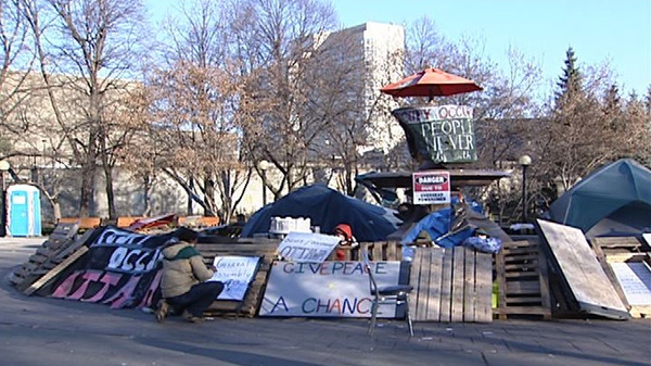 Occupy Ottawa's remaining campers have set up inside a fountain at Confederation Park Tuesday, Nov. 22, 2011.