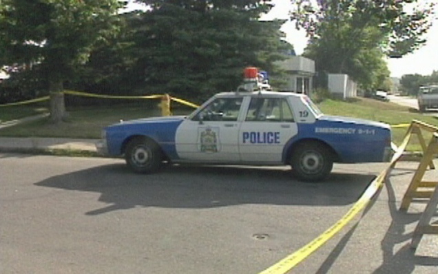 A police car is seen at the scene of a murder in Saskatoon on Aug. 28, 1992.