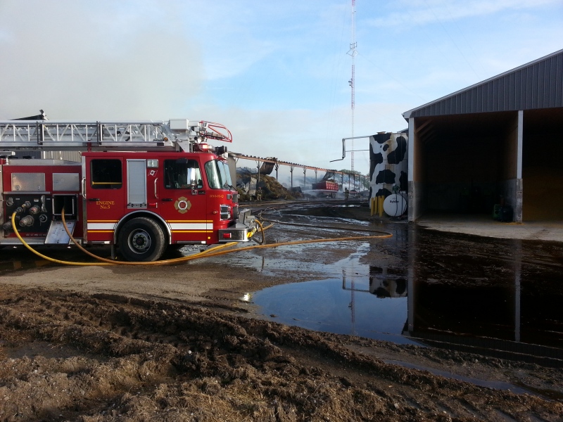 London fire crews continue to battle a blaze at a dairy farm on Thursday, May 29, 2014. (Justin Zadorsky/ CTV London)