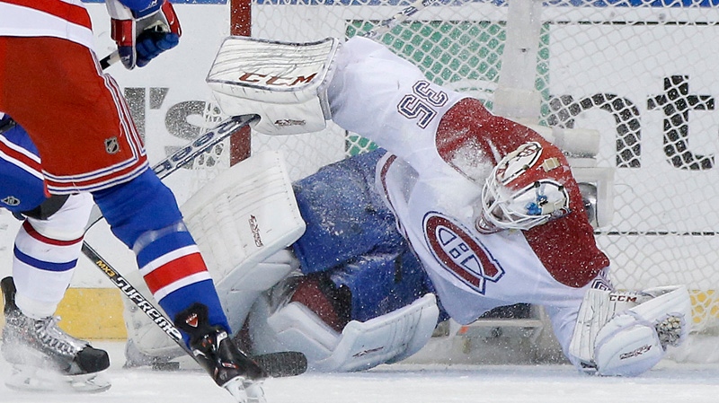 Montreal Canadiens goalie Dustin Tokarski (35) blo