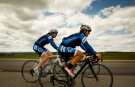 Clara Hughes, left, a multiple Olympic medalist, rides her bike near Millarville, Alta., Friday, May 30, 2014. Hughes rode across Canada to raise awareness about mental health and help end the stigma around mental illness. THE CANADIAN PRESS/Jeff McIntosh