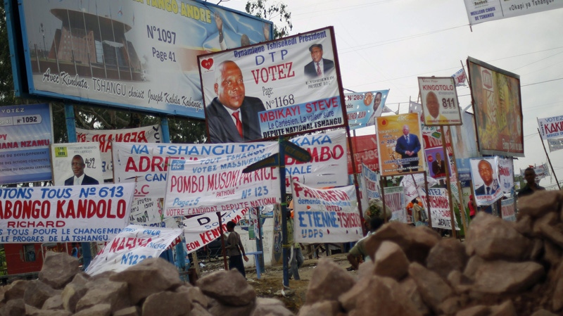 A sea of electoral posters line the streets of Kinshasa, Democratic Republic of Congo, Friday Nov. 25, 2011. (AP Photo/Jerome Delay)