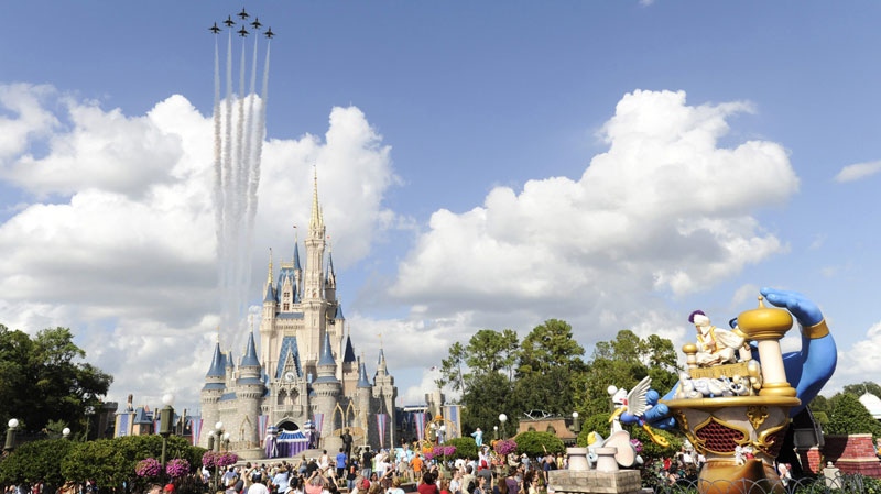 In this publicity image released by Disney, the U.S. Air Force Thunderbirds fly over the Magic Kingdom on Tuesday, Oct. 26, 2010, in Lake Buena Vista, Fla. 
