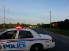 Police block a section of Oxford Street West, west of Sanatorium Road after a fatal crash on Wednesday, June 5, 2014. (Justin Zadorsky / CTV London)