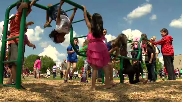 Students at King Edward School enjoy their new play structure.