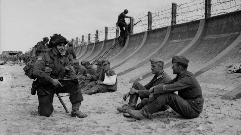 Juno Beach, Normandy; June 6,1944 - Second World War - German Prisoners taken by Canadian troops at Juno Beach, D-Day, during the invasion of Europe. (National Archives of Canada/Frank L. Dubervill )