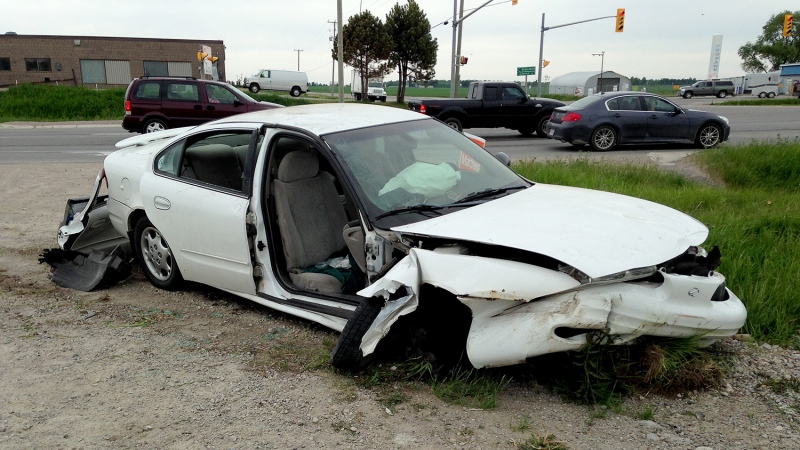 Three people in this vehicle were sent to hospital after it went into a culvert near Elmvale June 8, 2014. (Joe Mattenley / CTV Barrie)