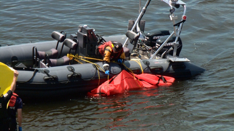 The Ottawa Police Marine, Dive and Trails Team recover a body from the Ottawa River. (Mark Dunlay/CTV Ottawa)