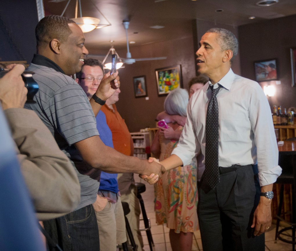 Barack Obama greets patrons at Va restaurant 