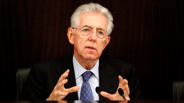 Italian Premier Mario Monti briefs the media in Rome, Sunday, Dec. 4, 2011. (AP / Pier Paolo Cito)