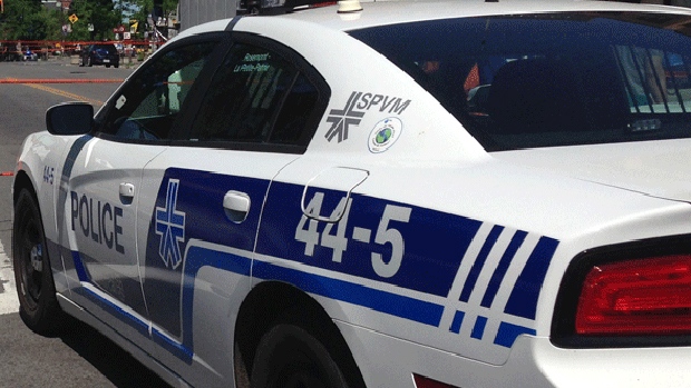 A police cruiser sits parked in Montreal.