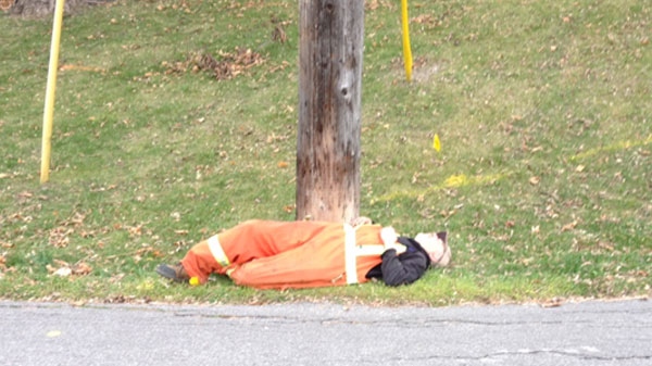 John Marinelli can be seen lying on the ground at Wellington Street and Commissioner Street Saturday, Nov. 26, 2011.
