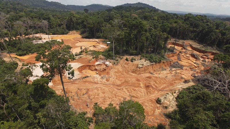 In this Sept. 15, 2009 photo, an illegal gold mine is seen in a national park forest near Novo Progresso in Brazil's northern state of Para. (AP Photo/Andre Penner)