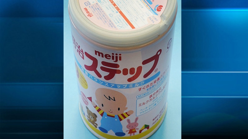In this photo taken Tuesday, Dec. 6, 2011, a canned powdered milk for infants Meiji Step, manufactured and sold by Japan's major food and candy maker Meiji Co., is shown. 