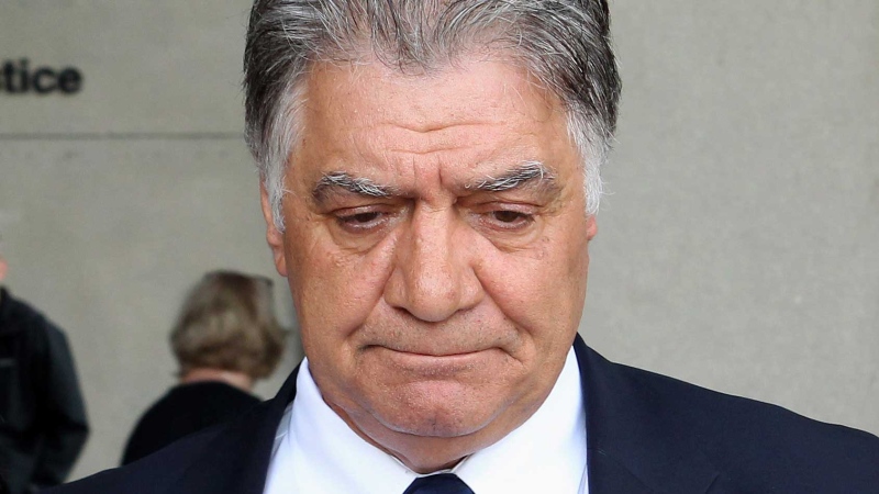 London Mayor Joe Fontana leaves the courthouse in London, Ont., after hearing the guilty verdict in his fraud trial on Friday June 13, 2014. (THE CANADIAN PRESS/Dave Chidley)