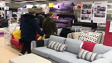 Some of the first shoppers make their way through Ottawa's new Ikea Wednesday, Dec. 7, 2011.