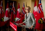 Ontario Premier Kathleen Wynne speaks to the media after winning a majority government at Queen's Park in Toronto on Friday, June 13, 2014. (Nathan Denette / THE CANADIAN PRESS)