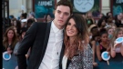 Shenae Grimes-Beech and Josh Beech arrive on the red carpet at the 2014 Much Music Video Awards in Toronto on Sunday June 15, 2014. THE CANADIAN PRESS/Nathan Denette