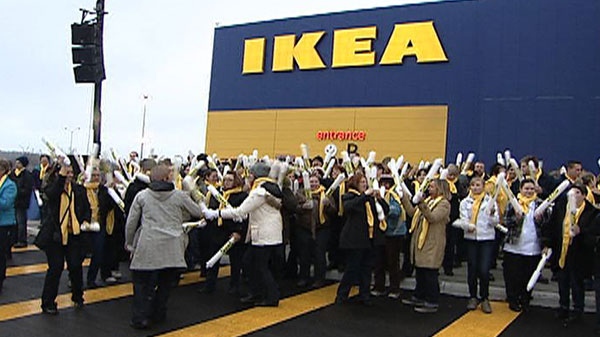 Ikea staff greets shoppers at the store's grand opening in Ottawa Wednesday, Dec. 7, 2011.