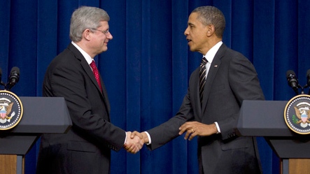 Prime Minister Stephen Harper shakes hands with U.S. President Barack Obama 