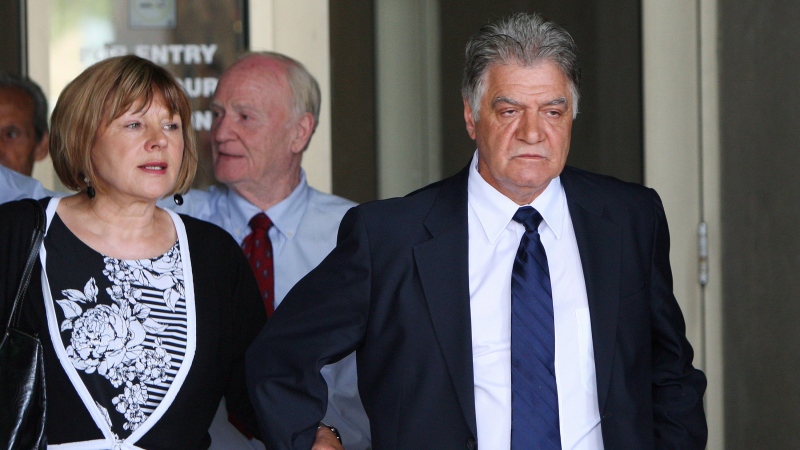 London Mayor Joe Fontana with his wife Vicky, walk from the London, Ont., courthouse after hearing the verdict in his fraud trial Friday June 13, 2014 (Dave Chidley / THE CANADIAN PRESS)