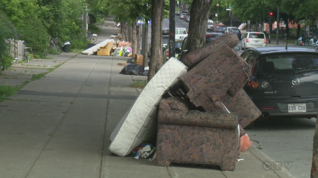 Garbage sits piled on a Montreal street