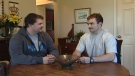 Scott Puillandre, right, and his brother discuss Scott's recovery from a helicopter crash in this file image from December 2011.