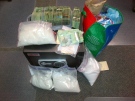 Items seized from a home on McGarry Drive in Kitchener are seen in this photo provided by Waterloo Regional Police.