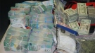 This image courtesy of the Ottawa Police Service shows drugs and cash seized by the Ottawa police, RCMP and Ontario Provincial Police as part of Operation Sleepwalker.