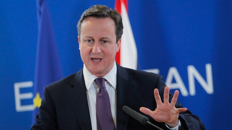 British Prime Minister David Cameron speaks during a media conference at an EU summit in Brussels on Friday, Dec. 9, 2011. (AP / Michel Euler) 