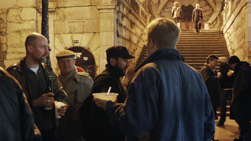 In this Jan. 19, 2006 file photo, volunteers distribute free pork soup to homeless people near the Gare de l'Est railway station, in Paris. 