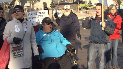 People with disabilities and their loved ones held a demonstration in New Westminster, B.C., to rally against Community Living BC service cuts. Dec. 11, 2011. (CTV) 