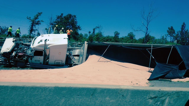 fertilizer spilled on Highway 401 