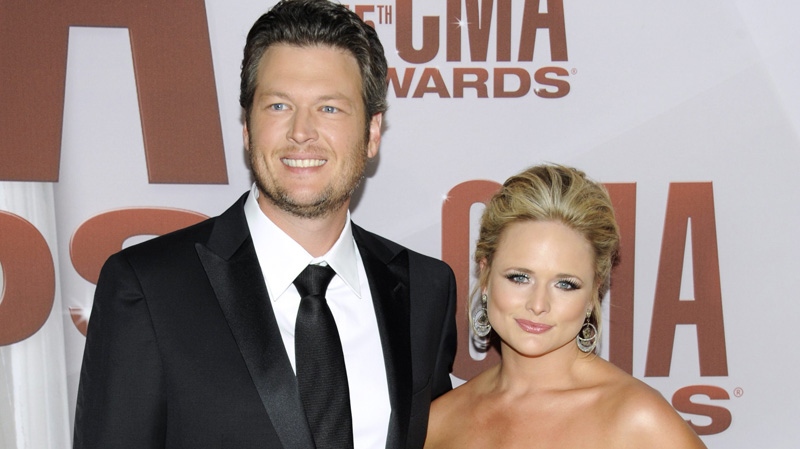 In this Nov. 9, 2011 file photo, married country singers Blake Shelton, left and Miranda Lambert arrive at the 45th Annual CMA Awards in Nashville, Tenn. Lambert is paying tribute to Blake Shelton�s late brother with her new single, "Over You." (AP Photo/Evan Agostini, file)