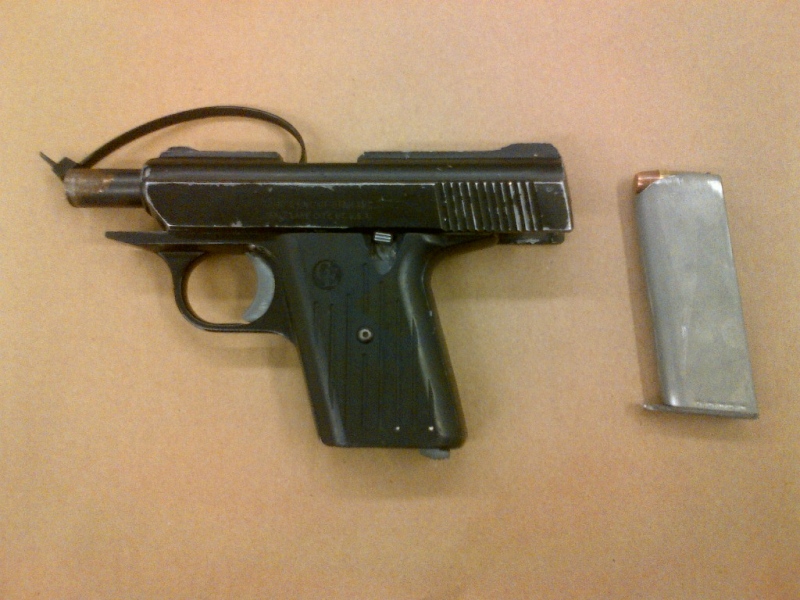 A Cobra Enterprises .380 semi-automatic handgun seized from a home on Allen Place is seen in this image released by the London Police Service on Tuesday, June 24, 2014..