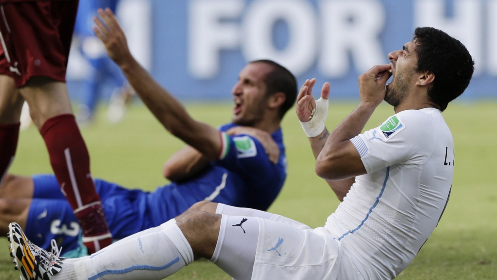 Suarez bites opponent in World Cup match