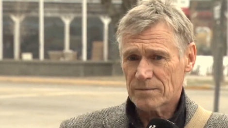 Allan Piche speaks to reporters outside a Grand Forks court, where he is being sentenced for feeding dangerous wildlife. Dec. 14, 2011. (CTV)