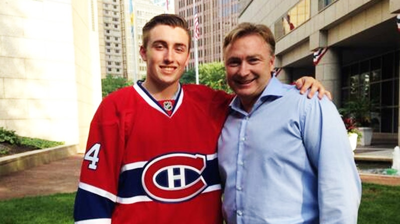 Daniel Audette, left, poses with his father, forme