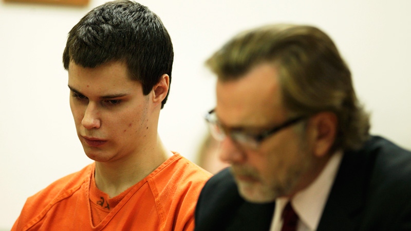 Colton Harris-Moore, left, also known as the "Barefoot Bandit," sits next to his attorney, John Henry Browne, right, in Island County Superior Court in Coupeville, Wash., Friday, Dec. 16, 2011. (AP / Ted S. Warren)