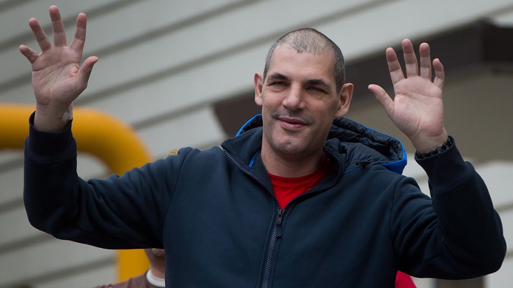 Gino Odjick greets supporters in Vancouver, B.C.