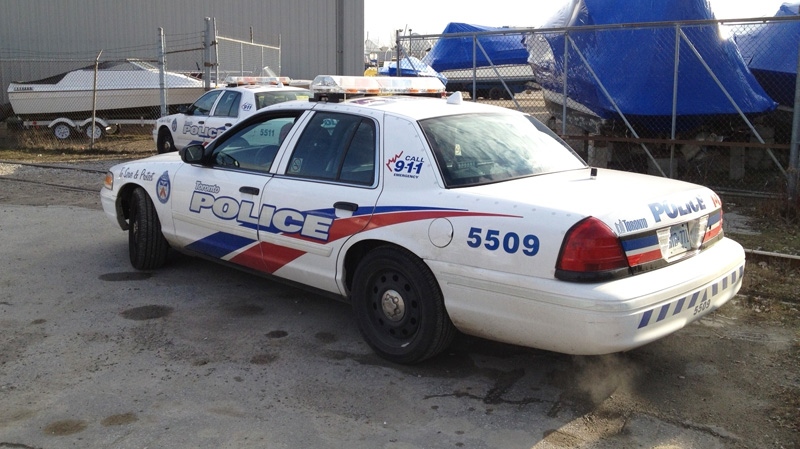 Police are shown at the scene where a body was found in Toronto on Sunday, Dec. 18, 2011. (Jeff Wood / CTV News)